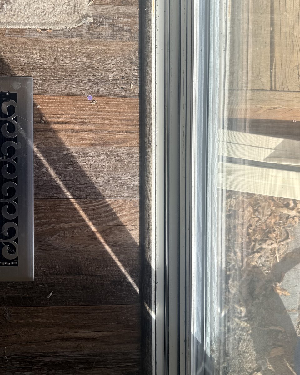 Window frame after cleaning, spotless white frame and sill